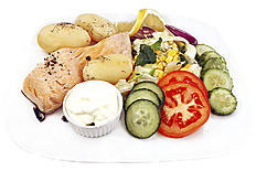 KOKT ØRRET /199,-  med agurk salat poteter og rømme (sitron)